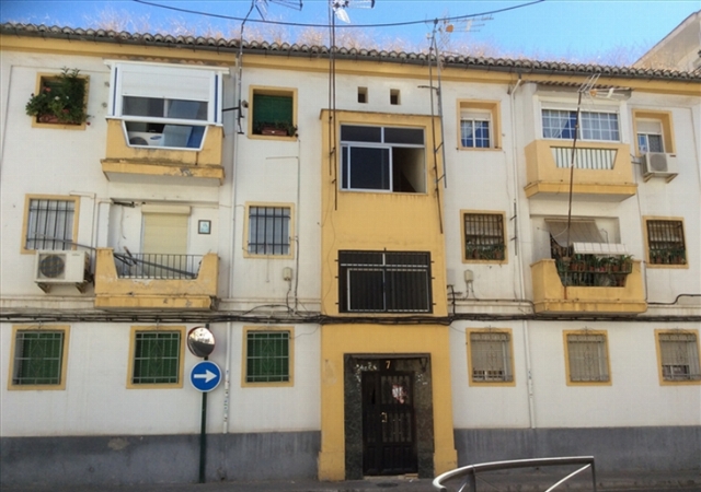 PISO SEGUNDO DERECHA, TIPO C, situado en la planta dicha, del BLOQUE NUMERO DOCE, de la calle Guadix, número siete, de esta Capital., GRANADA, Granada